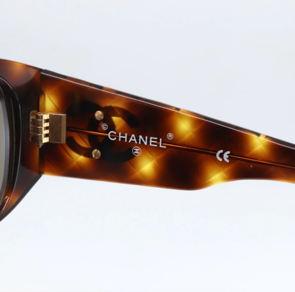 TRE49 - Chanel sunglasses plastic brown CC - 9